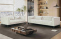 Austin Lounge Set in Cream – Sophisticated 2- and 3-seater duo styled in a modern living room, offering serene comfort and timeless elegance.