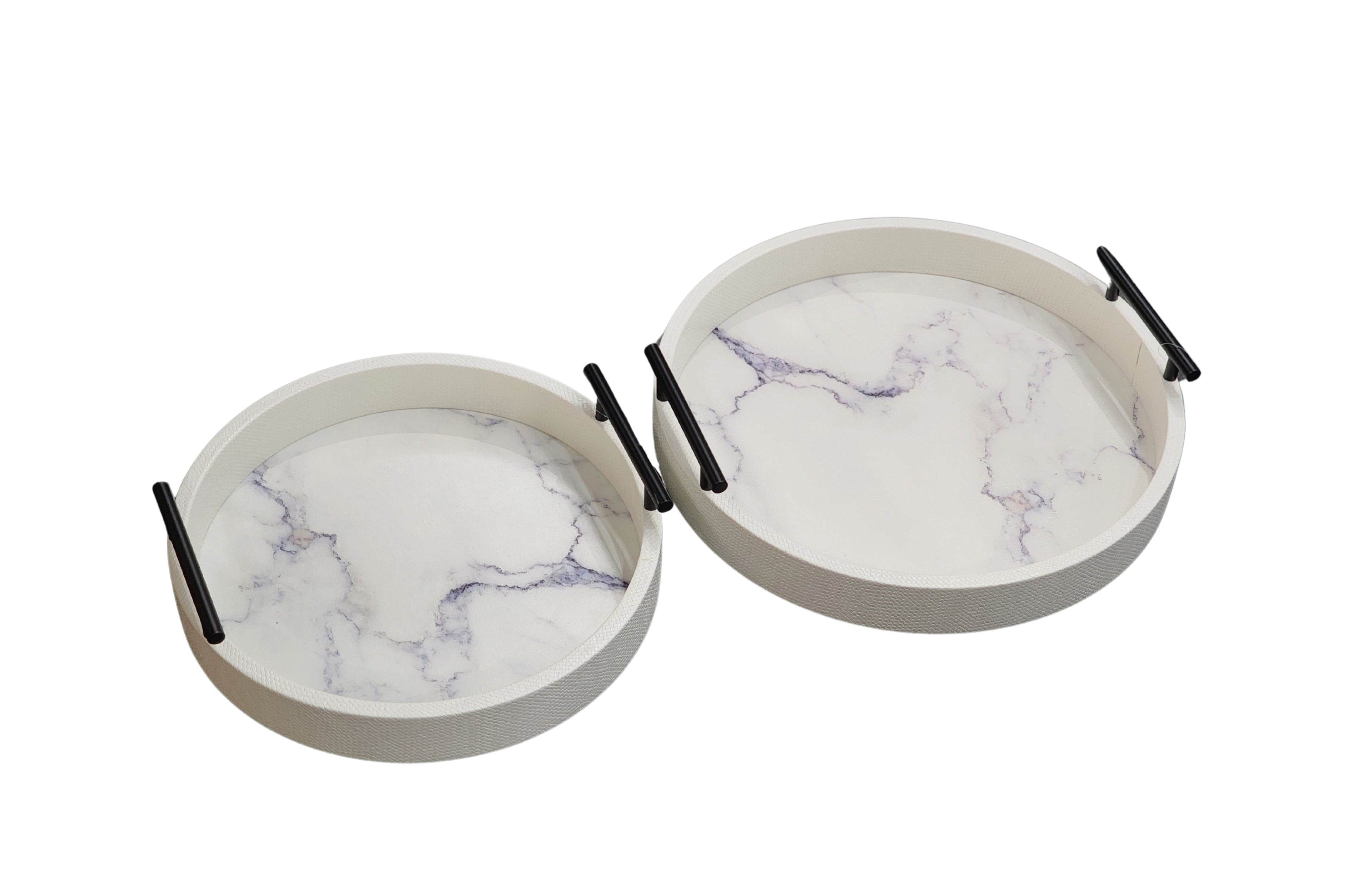 Set of two white round trays with faux marble base and gold handles, medium and small sizes.