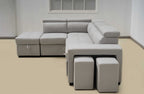 Light grey Hamilton modular chaise lounge with storage ottoman and stools in modern interior.