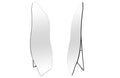 Irregular free standing mirror with sleek frameless design, unique shape and slim metal stand.