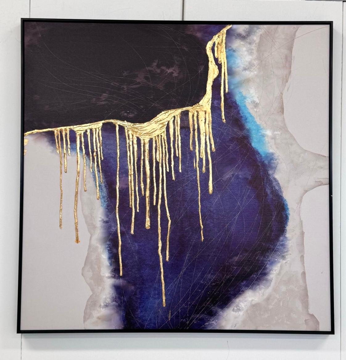 Modern square wall art in blue, black, and gold foil with sleek black frame.