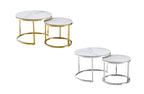 Layla nesting coffee tables in polished silver and gold frames with elegant marble finish tops.