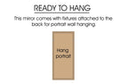 Mirror ready to hang with fixtures attached at the back, suitable for both portrait and landscape wall mounting.