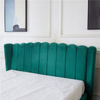 Close-up of Vienna Bed headboard in peacock green velvet with elegant channel tufting.