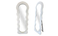 Cloud Wavy velvet mirror in cream, free standing or wall-mounted design with wavy frame.