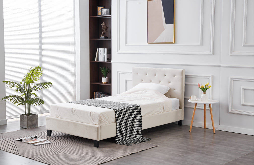 Side view of Winston Velvet Tufted Bed in light grey with elegant bedroom styling.