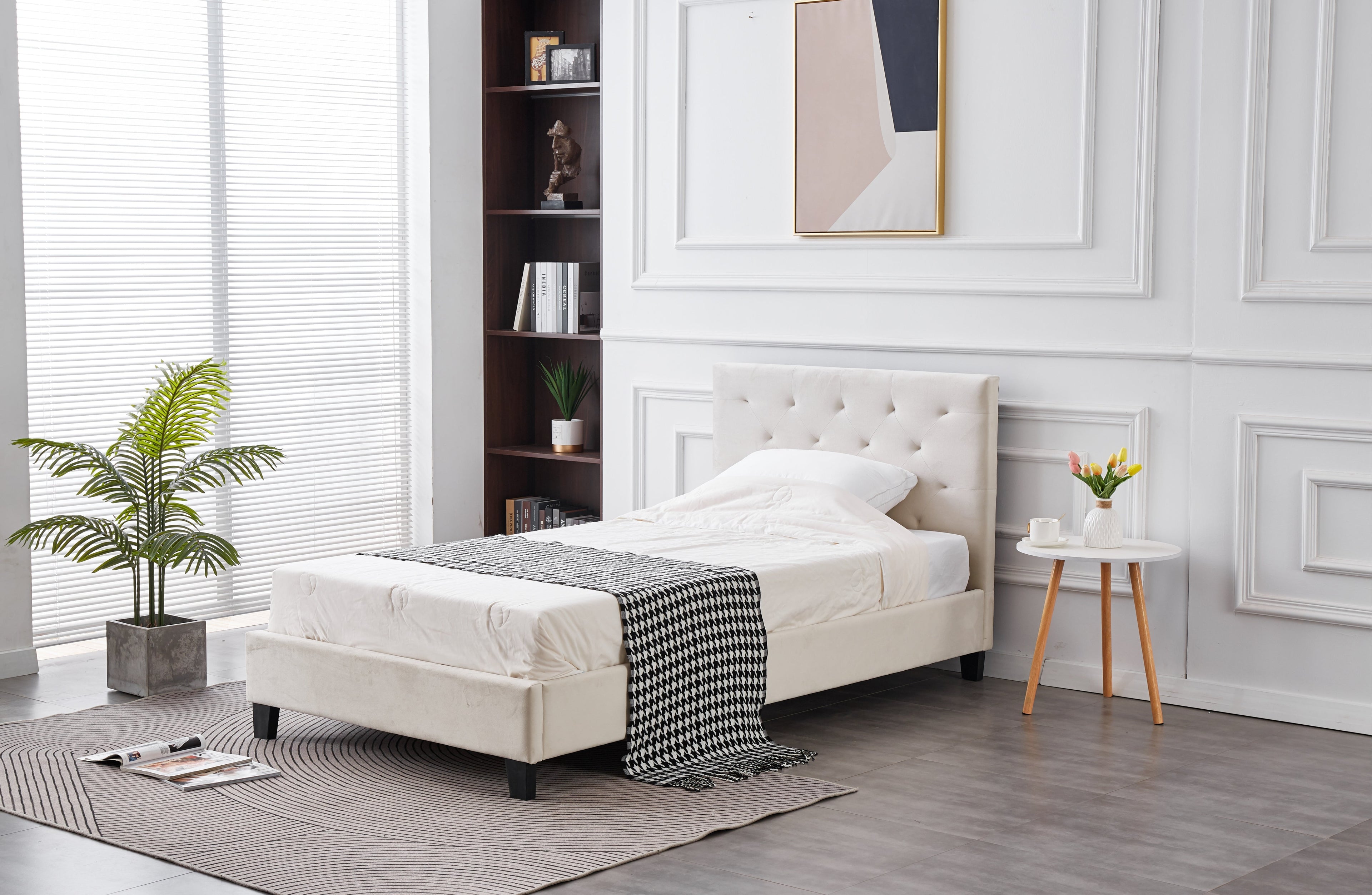 Side view of Winston Velvet Tufted Bed in light grey with elegant bedroom styling.